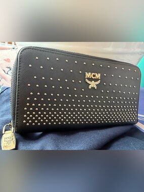 EUC - MCM Black Studded Zip-Around Wallet with Gold Logo